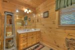 Sunrock Mountain Hideaway - Upstairs master bath with shower/tub combo
